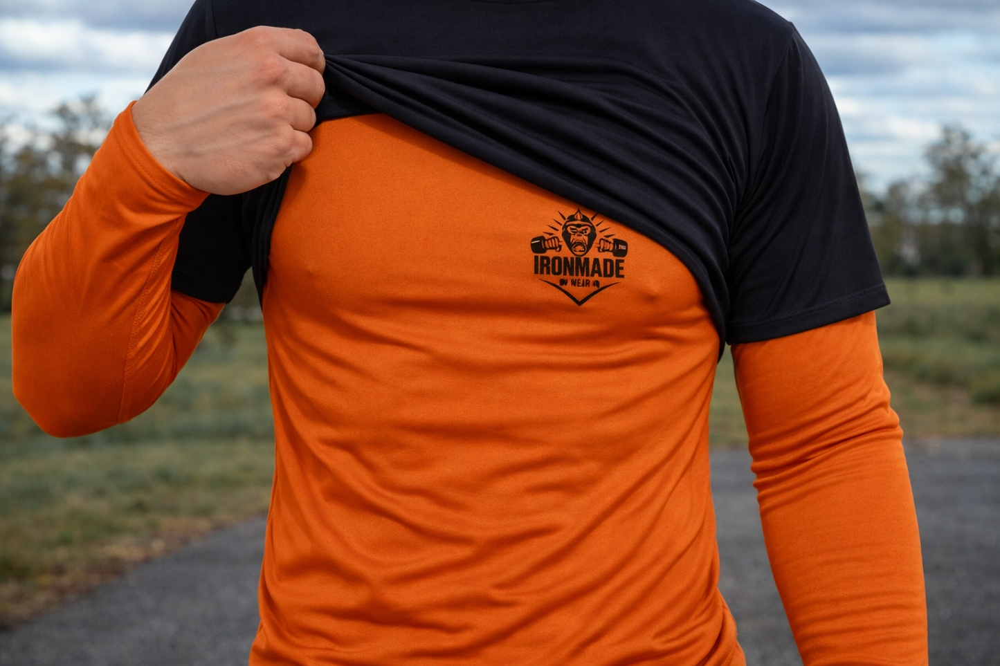 Men’s Baselayer in Electric Orange, lightweight Neoteric™ baselayer designed for year‑round training